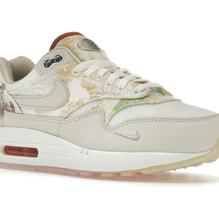Nike Air Max 1 '87 Metal Charms FJ7734-101, trois-quarts avant extérieur