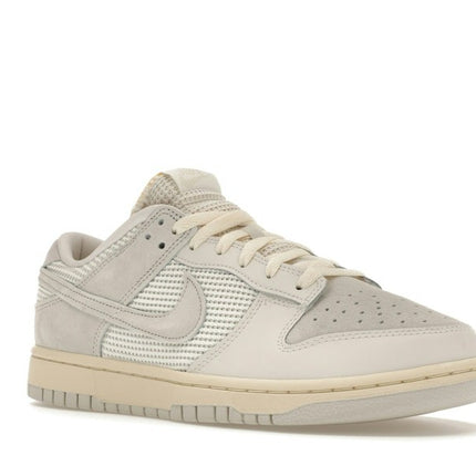 Nike Dunk Low Phantom Light Bone HF4297-001, trois-quarts avant extérieur
