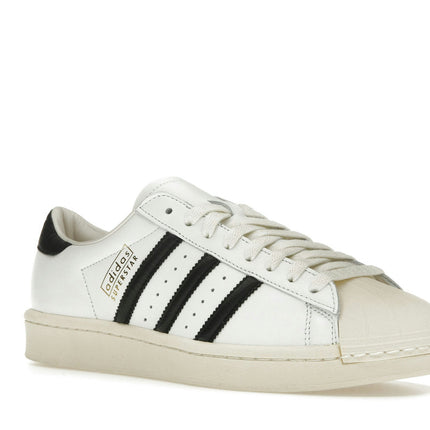 Adidas Superstar Vintage White Black Made In Germany JI3138, trois-quarts avant extérieur