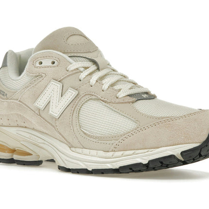 New Balance 2002R Calm Taupe M2002RCC, trois-quarts avant extérieur