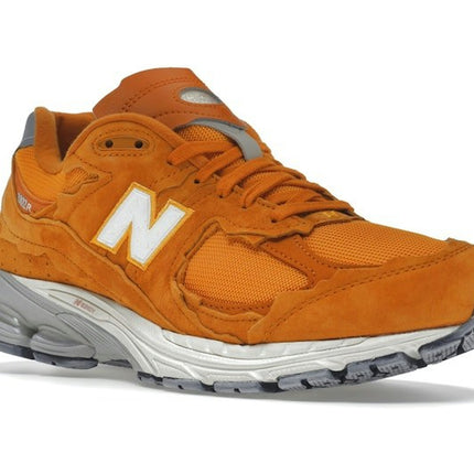 New Balance 2002R Protection Pack Vintage Orange M2002RDE, trois-quarts avant extérieur