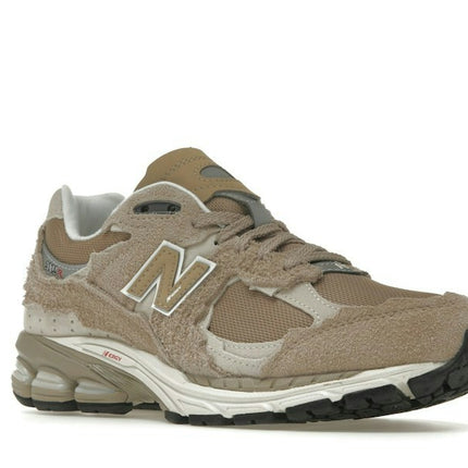 New Balance 2002R Protection Pack Beige M2002RDL, trois-quarts avant extérieur