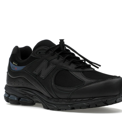 New Balance 2002R Gore-Tex JJJJound Black Storm M2002RXW, trois-quarts avant extérieur