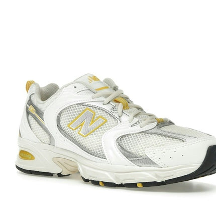New Balance 530 Metallic Yellow MR530SY, trois-quarts avant extérieur