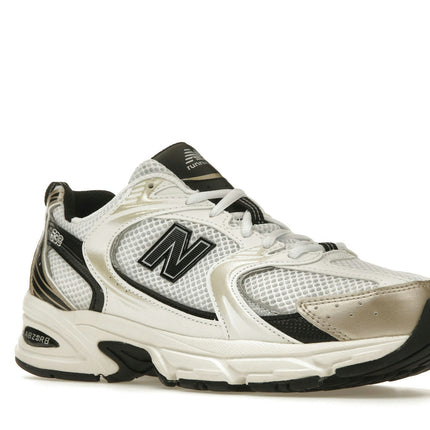 New Balance 530 White Light Gold Metallic MR530TC, trois-quarts avant extérieur